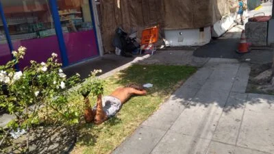 Homeless sleeping 99 cent only store