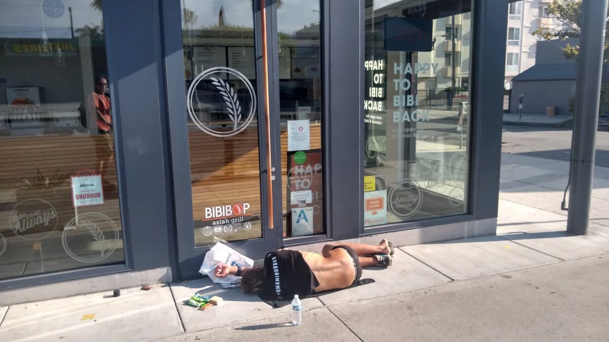 Homeless in front of a store
